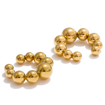 Brincos Zenzile Kenza - earcuff de inspiração africana, dourado